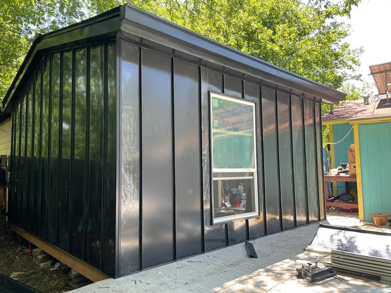 Black standing seam metal wall panels for Roof Inspection in Pittstown